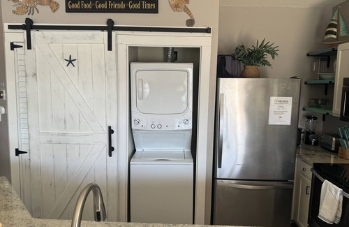 Holiday Isle Condo | Coastal Charm, pet friendly, private beach, free beach chairs service.