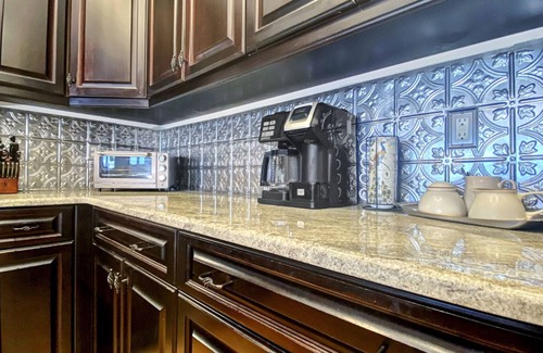 Indian Shores Condo | Coastal condo with striking sunrise & wildlife views - pool, fishing dock access