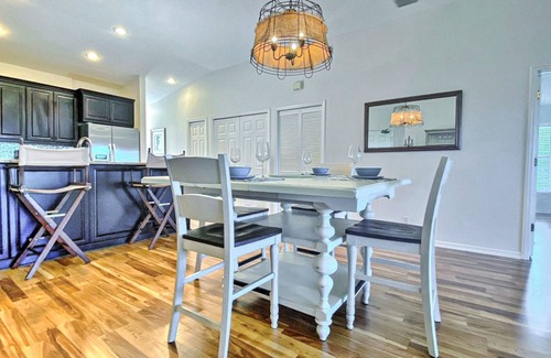 Indian Shores Condo | Coastal condo with striking sunrise & wildlife views - pool, fishing dock access