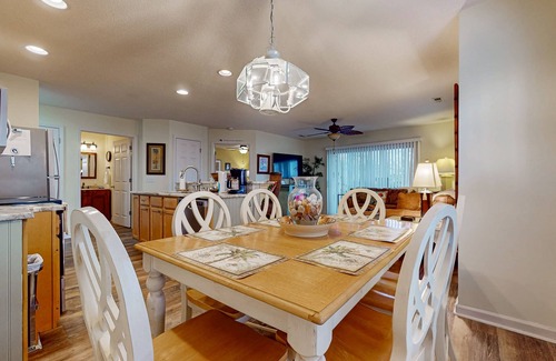 St. James Condo | Coastal Condo with golf course view and shared pool access