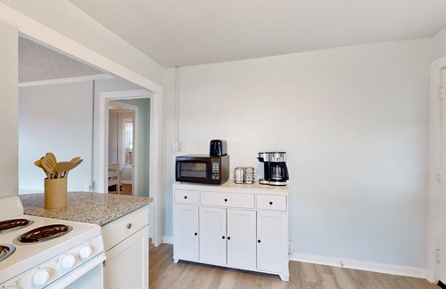 Kure Beach Cottage | Coastal cottage with short walk to the beach and fishing pier