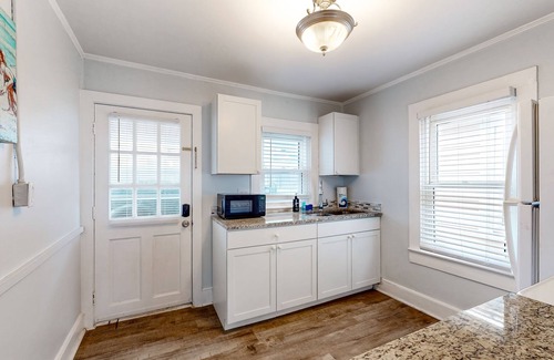 Kure Beach Cottage | Coastal cottage with short walk to the beach and fishing pier