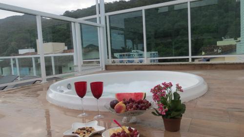 Praia Grande Apartment | Cobertura Santorini Nova com Spa e Solário na Praia Grande