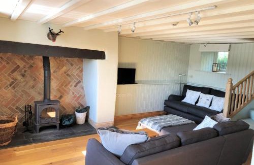 Menai Bridge House | Coed y Berclas cottage, private orchard with stunning views