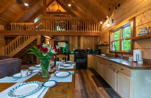 Logan Cabin | Cohosh - Hand hewn private log cabin with views