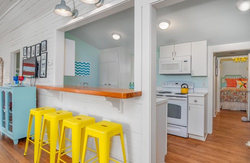 Tybee Island Cottage | Colorful Tybee Cottage | Saltwater Pool & Steps to Beach | by Tybee Cottages