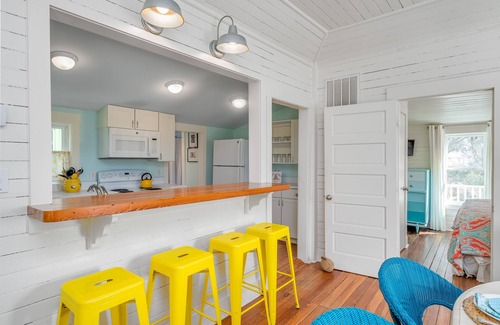 Tybee Island Cottage | Colorful Tybee Cottage | Saltwater Pool & Steps to Beach | by Tybee Cottages