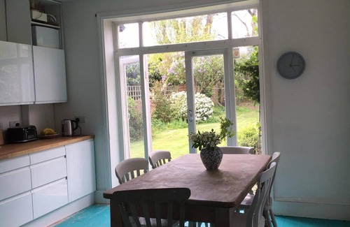 Brent Apartment | Colourful two bedroom flat with a large garden