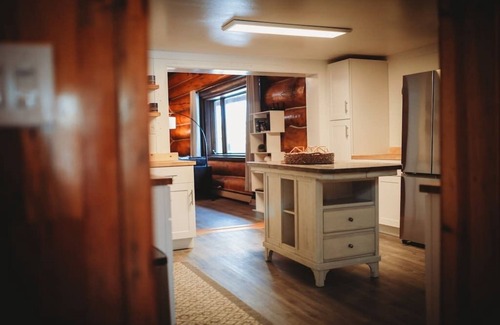 College House | Come stay in this massive historic log mansion