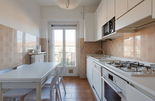 Lambrate Apartment | Comfortable 100sqm flat located on the fourth floor (with lift), equipped with kitchen, living area, two bathrooms and two bedrooms that can accommodate up to 4 people. A short walk from Lambrate and Udine stations, it is conveniently located to reach th