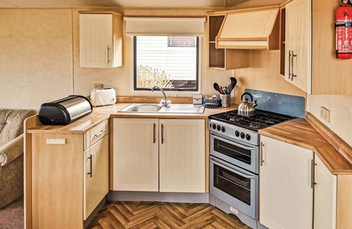 Perranporth House | Comfortable and spacious 12ft-wide caravan with one double and one twin.