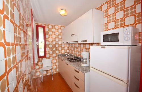 Lignano Pineta Apartment | Comfortable and Modern Stay with Pool and Resort-Style Services