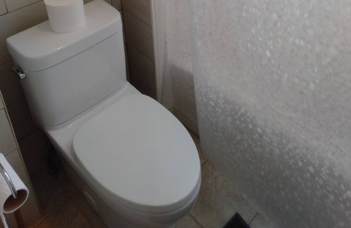 London House | Comfortable newly-renovated East End home. Minimum rental 29 days.