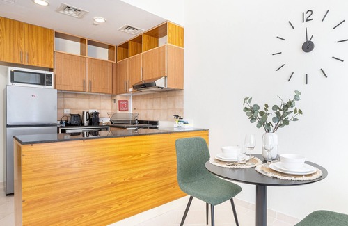 Dubai Production City Apartment | Comfortable Studio at Lago Vista A Dubai Production City by Deluxe Holiday
