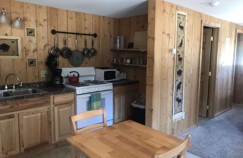 Cooke City-Silver Gate Cabin | Comfy cabin is situated on the Silver Gate property which overlooks 10,000ft tall mountain peaks surrounding the town.