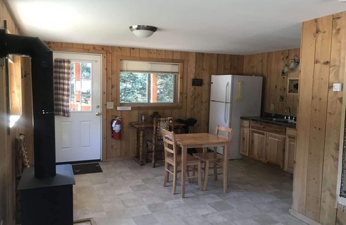 Cooke City-Silver Gate Cabin | Comfy cabin is situated on the Silver Gate property which overlooks 10,000ft tall mountain peaks surrounding the town.