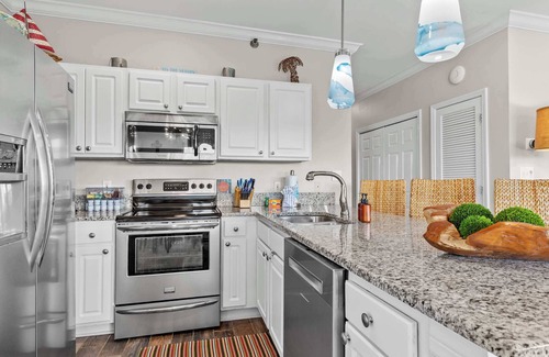 Orange Beach Condo | Comfy Family Condo | Fresh Air, Pool, Beach Walkable | Daily Activity Deals