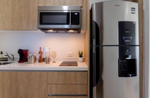 Luis Donaldo Colosio Apartment | Comfy Studio Steps to 5th Ave and Beach, Pool, Gym