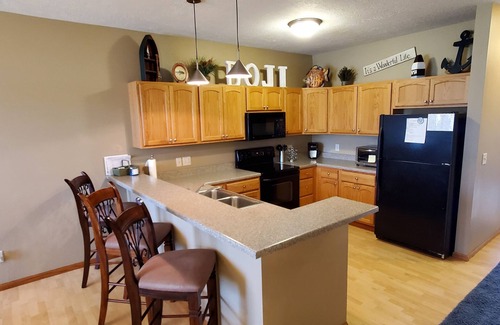 Arnolds Park Condo | Condo, Arnolds Park, Walk to Restaurants & Shops, 4 Bedroom, 2 Bath, Pool