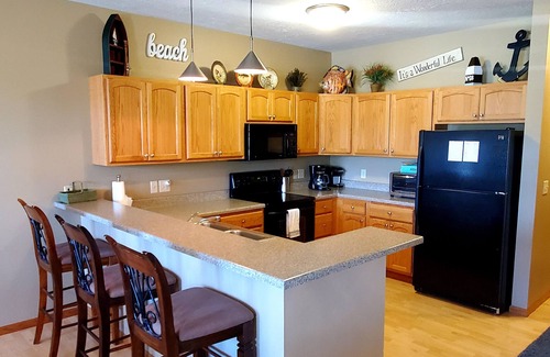 Arnolds Park Condo | Condo, Arnolds Park, Walk to Restaurants & Shops, 4 Bedroom, 2 Bath, Pool