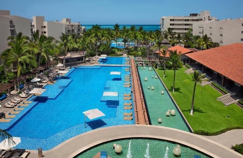Las Glorias Condo | Condo at front of the beach inside a Resort compound hotel.