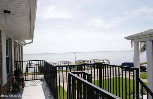 Titusville Condo | Condo with a view of rocket launches and dolphins.