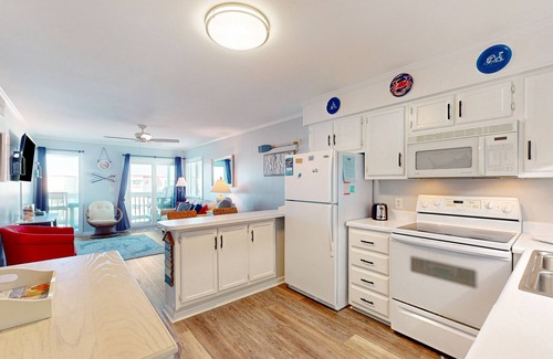 Morehead City Condo | Condo with on-site beach access, pools, grill/picnic areas, & private balcony