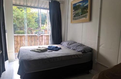 Morretes Apartment | Condomínio Containers está localizado a 900m do centro de Morretes, local calmo e em meio a mata Atlântica