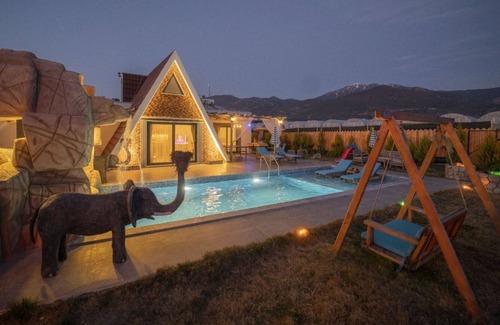 Faralya Villa | conservative villa with large garden and kids playing area