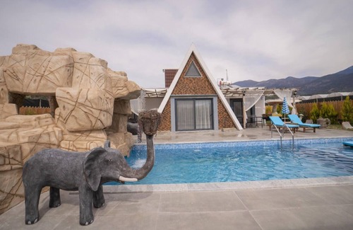 Faralya Villa | conservative villa with large garden and kids playing area