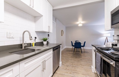 Beach Park Apartment | Contemporary 2BR Stay | Pool, Gym & Grill Area