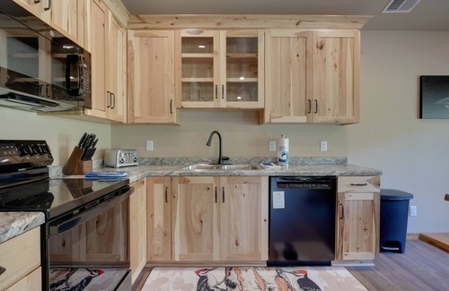 Conover House | Contemporary dog-friendly cabins with hot tub, fireplaces, patios, & game room