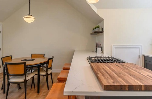 Uptown Apartment | Convenient, walkable apartment with fireplace, washer/dryer, & full kitchen