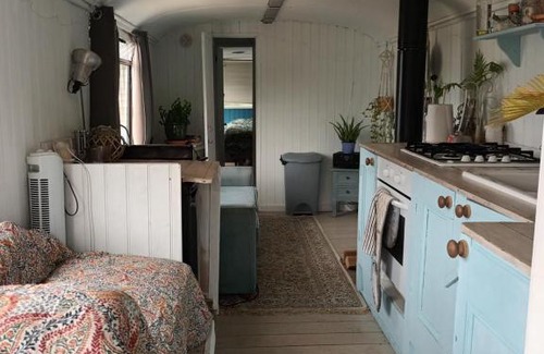 Black Torrington Apartment | Converted French bus with stunning views
