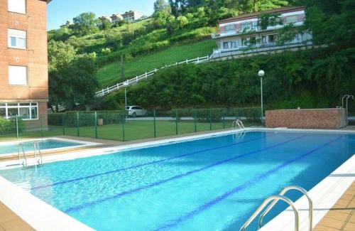 Suances Apartment | Coqueto y cómodo apartamento con piscina y padel - dos habitaciones