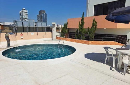 Gonzaga Apartment | Cosmopolitan Praia Flat