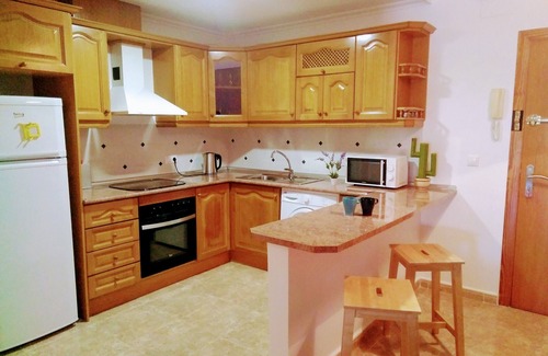 Orihuela Costa Condo | Costamarina apartment with pool 600 meters from the sea.