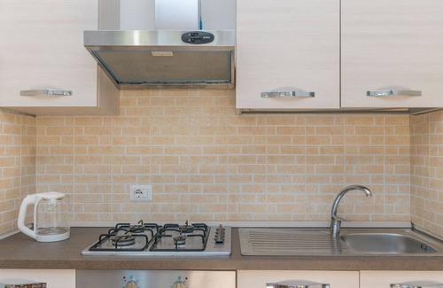 Capo Testa Apartment | Cosy apartment for 4 guests with A/C, TV, terrace and pets allowed
