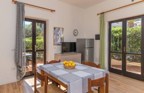 Capo Testa Apartment | Cosy apartment for 4 guests with A/C, TV, terrace and pets allowed