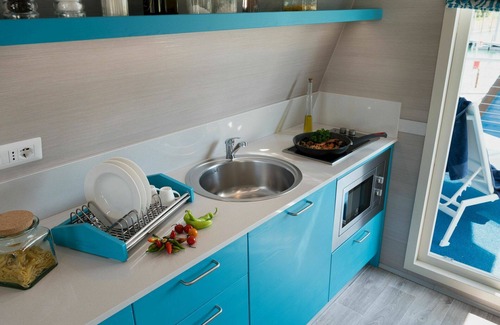 Lignano Sabbiadoro House | Cosy apartment in villa for 6 guests with pool, A/C, WIFI, TV, terrace and pets allowed