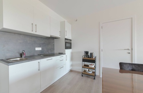 Blankenberge Apartment | Cosy apartment for 4 guests with pool, WIFI, TV and balcony