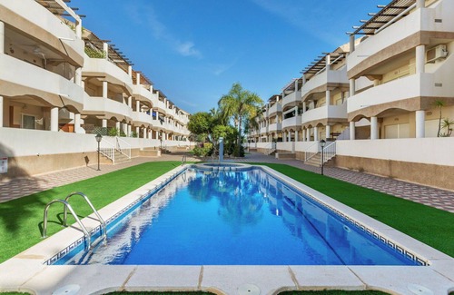 Vinaros Apartment | Cosy apartment for 4 people with A/C, pool, TV, patio and pets allowed