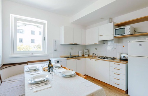 Caldonazzo Apartment | Cosy apartment for 4 people with WIFI, TV, patio and pets allowed