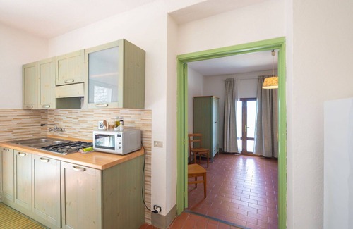 Montebonello Apartment | Cosy apartment for 4 guests with WIFI, A/C, pool, TV, pets allowed and panoramic view