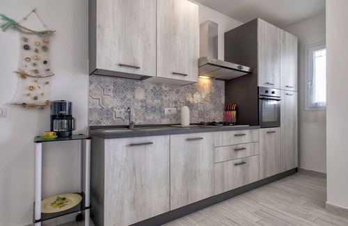 La Muddizza Apartment | Cosy apartment for 6 guests with pool, WIFI, A/C, TV, patio and pets allowed