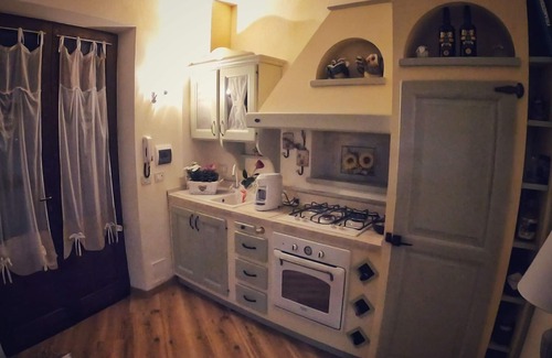 Po' Bandino Villa | Cosy apartment in villa for 2 people with WIFI, pool, A/C, hot tub, TV and panoramic view