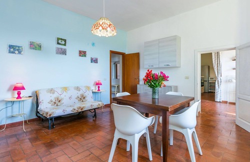 Follonica Villa | Cosy apartment in villa for 12 people with private pool, WIFI, TV, patio and pets allowed