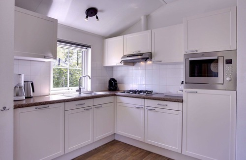 Municipality of Dalfsen House | Cosy apartment in villa for 4 people with WIFI, pool, TV and terrace