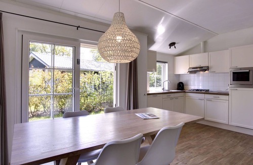 Municipality of Dalfsen House | Cosy apartment in villa for 4 people with WIFI, pool, TV and terrace