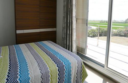 L'Ampolla House | Cosy apartment in villa for 6 people with WIFI, A/C, pool, TV, patio, pets allowed and parking